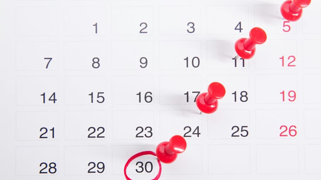 Calendar and planning imagery representing the monthly governance cycle